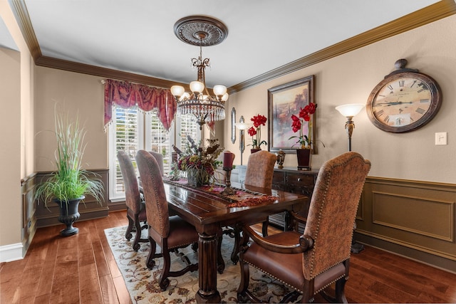 7904 Linksview Dr, Mckinney, TX 75072 - dining area with ornamental molding, a chandelier, wainscoting, and wood finished floors