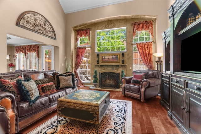 7904 Linksview Dr, Mckinney, TX 75072 - living room with ornamental molding, wood finished floors, and a fireplace