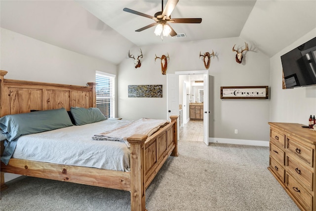 110 Oak View Dr, Godley, TX 76044 - bedroom featuring vaulted ceiling, light carpet, baseboards, a ceiling fan, and connected bathroom