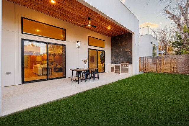 3940 N Cresthaven, Dallas, TX 75209 - back of house featuring exterior kitchen and a patio area