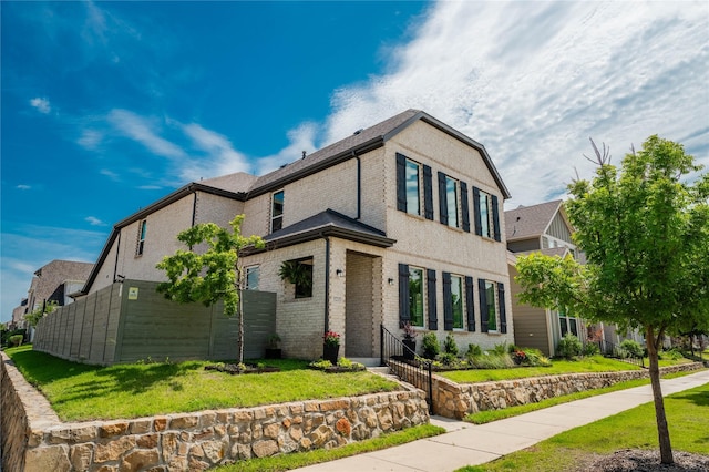 5215 Mareliz Ln, Sachse, TX 75048 - view of front of home with brick siding and a front lawn