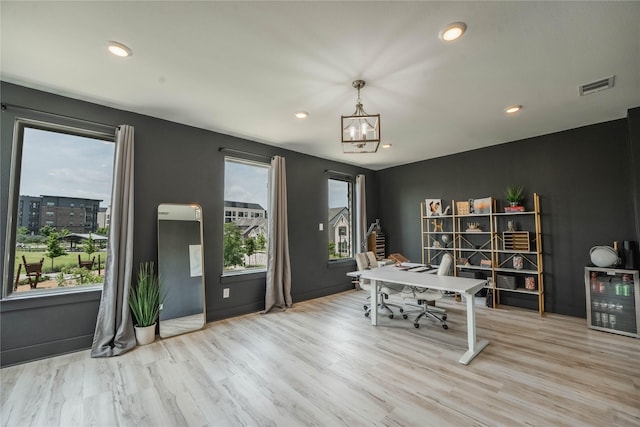 5215 Mareliz Ln, Sachse, TX 75048 - office with wine cooler, healthy amount of natural light, wood finished floors, and recessed lighting