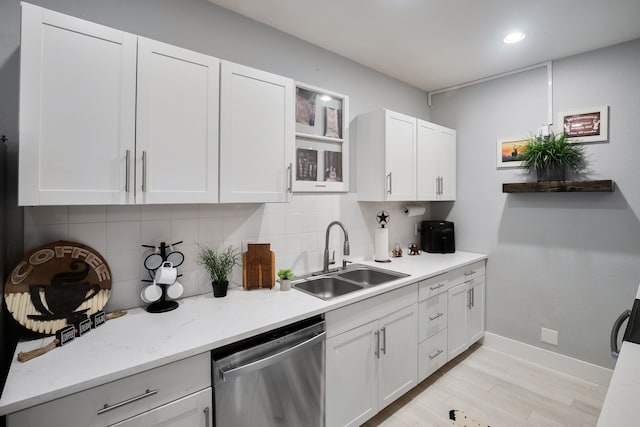 1430 Rs County Road 1605, Point, TX 75472 - kitchen with stainless steel dishwasher, a sink, backsplash, light wood finished floors, and recessed lighting