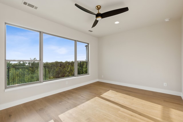 4929 Blaynes Vw, The Colony, TX 75056 - unfurnished room featuring baseboards, ceiling fan, wood finished floors, recessed lighting, and a smoke detector