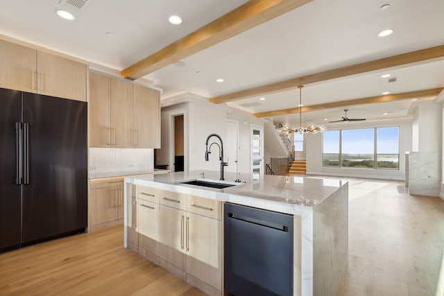 4929 Blaynes Vw, The Colony, TX 75056 - kitchen featuring high end refrigerator, light brown cabinetry, modern cabinets, dishwasher, and a sink
