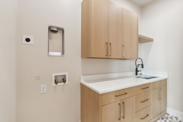 4929 Blaynes Vw, The Colony, TX 75056 - washroom featuring hookup for an electric dryer, hookup for a washing machine, gas dryer hookup, baseboards, and cabinet space