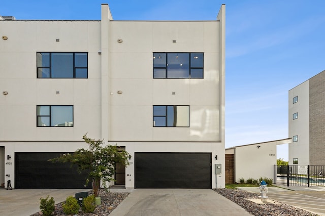 4929 Blaynes Vw, The Colony, TX 75056 - view of front of home featuring a garage, stucco siding, and driveway