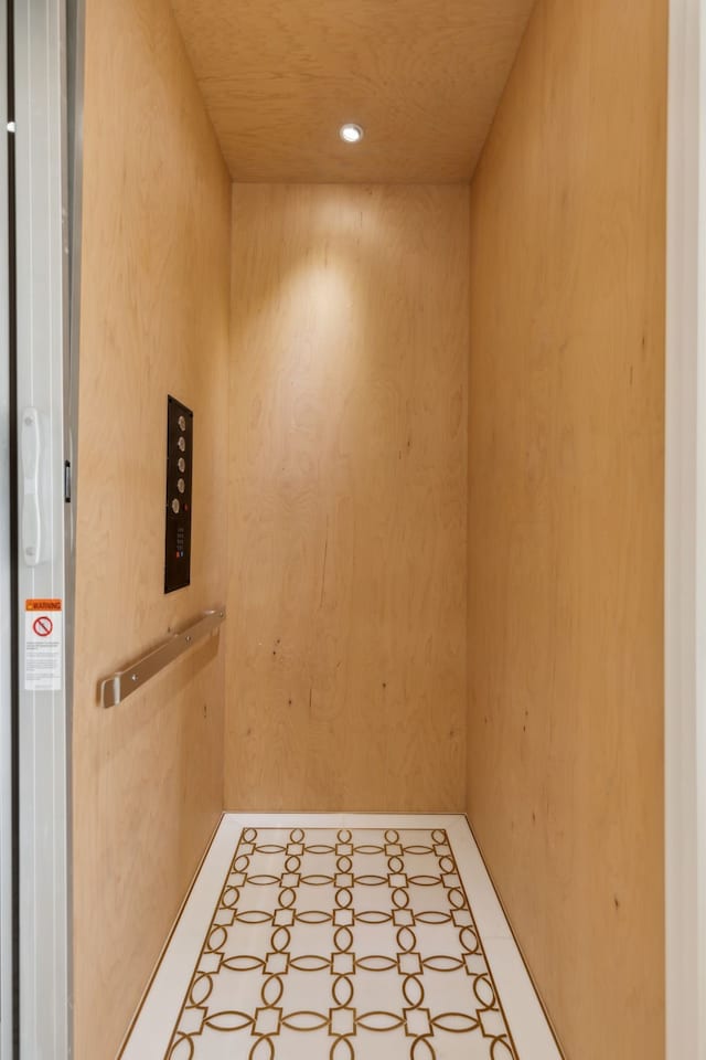 4929 Blaynes Vw, The Colony, TX 75056 - elevator featuring tile patterned floors