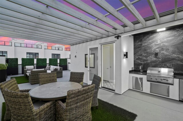 13001 Hutton Dr Unit 31, Farmers Branch, TX 75234 - view of patio / terrace featuring a pergola, outdoor dining area, and a sink