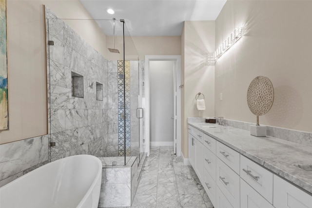 13001 Hutton Dr Unit 31, Farmers Branch, TX 75234 - bathroom with vanity, a shower stall, a freestanding bath, marble finish flooring, and baseboards
