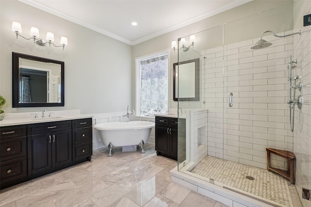 8304 Old Hickory Ln, Mckinney, TX 75072 - full bath with a stall shower, vanity, a soaking tub, marble finish flooring, and ornamental molding