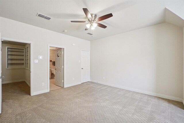 8304 Old Hickory Ln, Mckinney, TX 75072 - unfurnished bedroom with light colored carpet, baseboards, ceiling fan, and ensuite bath