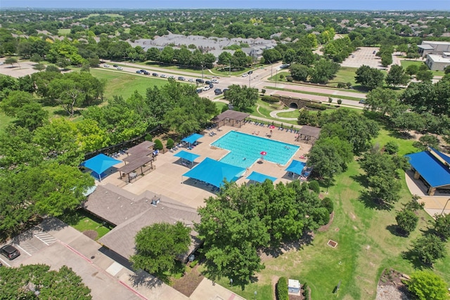 8304 Old Hickory Ln, Mckinney, TX 75072 - bird's eye view of a pool and a tree filled landscape