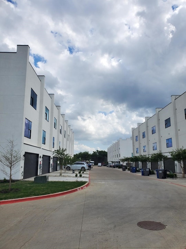 13001 Hutton Dr Unit 25, Farmers Branch, TX 75234 - view of concrete road with curbs
