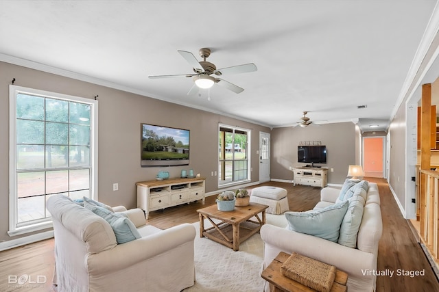 4382 Circle Square Dr, Mooringsport, LA 71060 - living area with ceiling fan, ornamental molding, wood finished floors, and baseboards