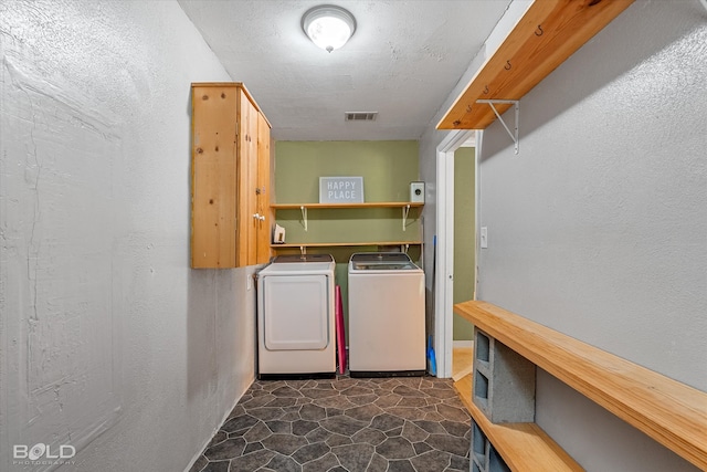 4382 Circle Square Dr, Mooringsport, LA 71060 - washroom featuring separate washer and dryer and a textured wall