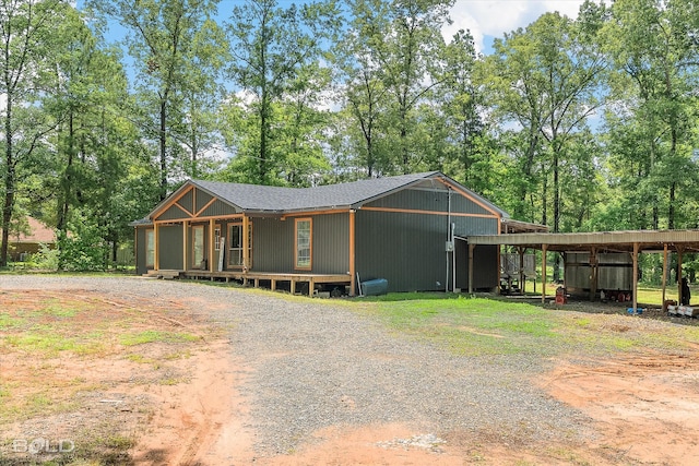 4382 Circle Square Dr, Mooringsport, LA 71060 - view of front of house with driveway and view of wooded area