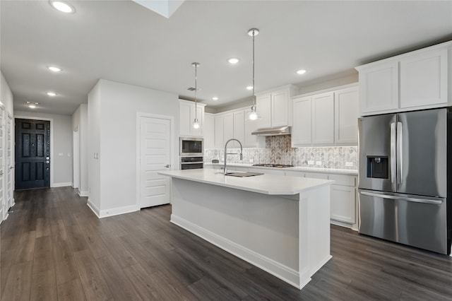 6133 Poolside Way, Royse City, TX 75189 - kitchen featuring appliances with stainless steel finishes, under cabinet range hood, light countertops, decorative backsplash, and recessed lighting