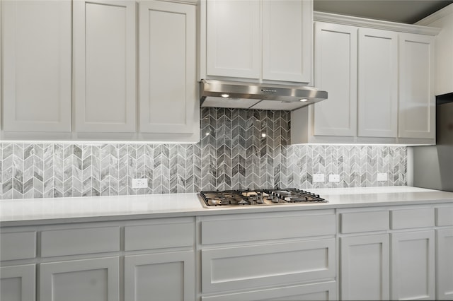 6133 Poolside Way, Royse City, TX 75189 - kitchen with light countertops, under cabinet range hood, white cabinets, and stainless steel gas stovetop