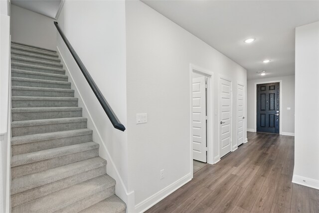 6133 Poolside Way, Royse City, TX 75189 - staircase featuring baseboards, recessed lighting, and wood finished floors