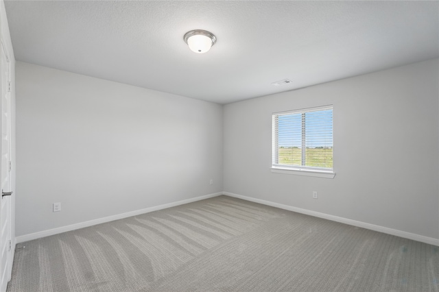 6133 Poolside Way, Royse City, TX 75189 - spare room featuring carpet flooring and baseboards
