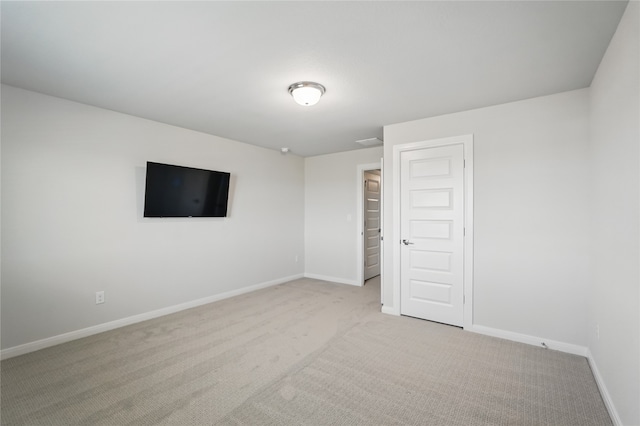 6133 Poolside Way, Royse City, TX 75189 - unfurnished bedroom with light carpet and baseboards