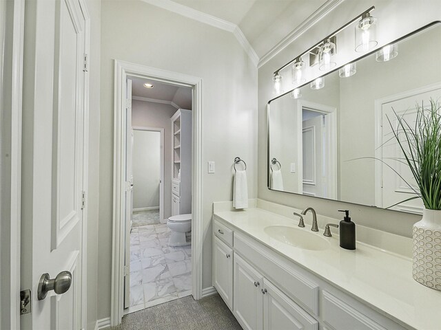 4033 Oakhaven Dr, Plano, TX 75093 - bathroom with marble look tiles, crown molding, vanity, toilet, and baseboards