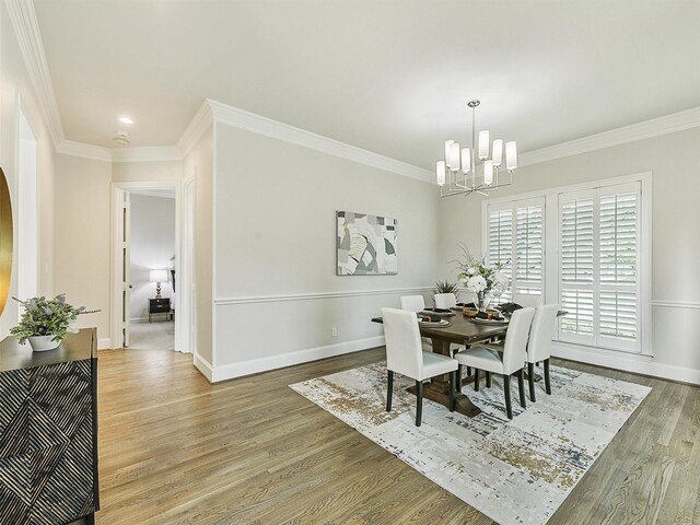 4033 Oakhaven Dr, Plano, TX 75093 - dining room with a chandelier, light wood-style flooring, crown molding, baseboards, and arched walkways