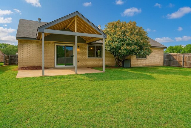 3825 Hackberry Ln, Bedford, TX 76021 - back of house featuring a patio area, brick siding, and central air condition unit