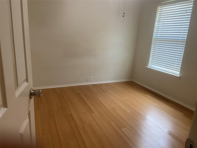 1106 Mule Deer Dr, Arlington, TX 76002 - spare room with light wood-style floors and baseboards