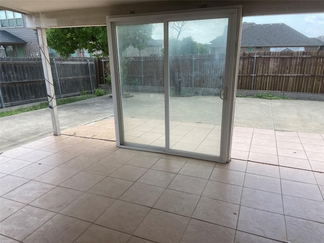 1106 Mule Deer Dr, Arlington, TX 76002 - doorway to outside featuring tile patterned flooring