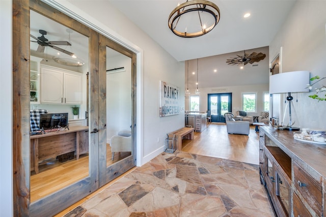 221 Cattle Trl, Tioga, TX 76271 - entryway with ceiling fan, light stone finish flooring, french doors, recessed lighting, and a high ceiling