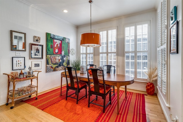 3548 Granada Ave, University Park, TX 75205 - dining room with healthy amount of natural light, wood finished floors, baseboards, ornamental molding, and recessed lighting