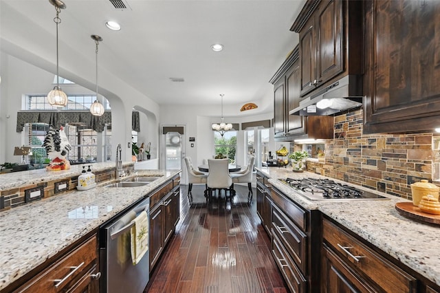 505 Kappa Way, Mckinney, TX 75071 - kitchen with appliances with stainless steel finishes, a sink, under cabinet range hood, light stone counters, and recessed lighting
