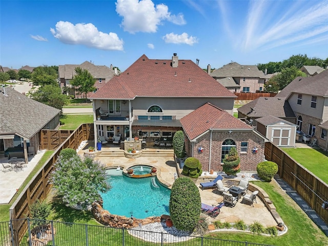 505 Kappa Way, Mckinney, TX 75071 - back of property with a patio area, a fenced backyard, a residential view, a balcony, and a chimney