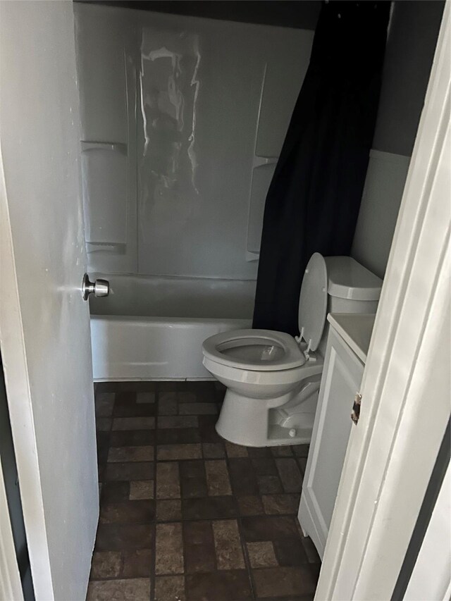 2907 W Collin St, Corsicana, TX 75110 - bathroom featuring toilet, vanity, and shower / tub combo with curtain