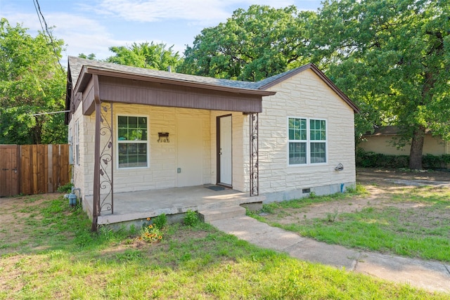 4106 Wheeler St, Fort Worth, TX 76117 - bungalow with stone siding, covered porch, and crawl space