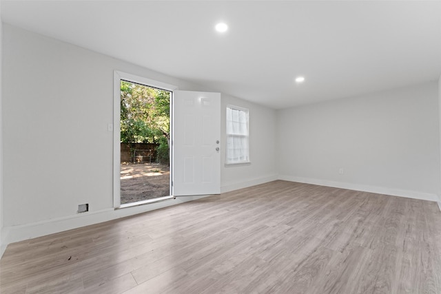 4106 Wheeler St, Fort Worth, TX 76117 - empty room featuring light wood-style flooring, baseboards, and recessed lighting