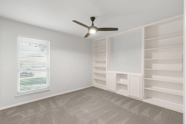 4814 Rhea Rd, Wichita Falls, TX 76308 - unfurnished bedroom with carpet flooring, baseboards, and a ceiling fan