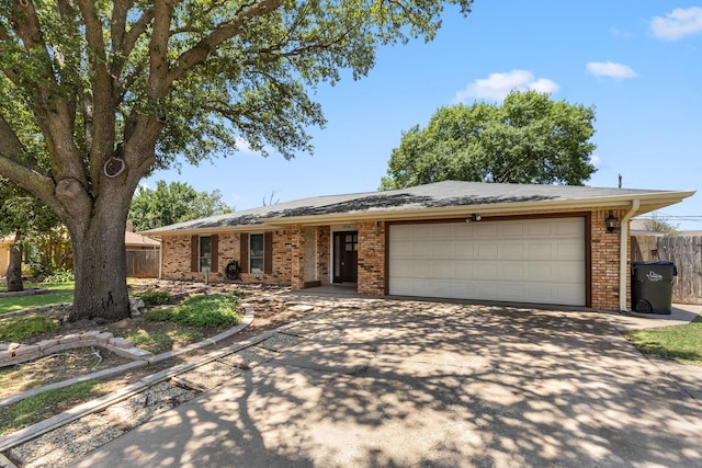 4814 Rhea Rd, Wichita Falls, TX 76308 - single story home featuring driveway, brick siding, and a garage