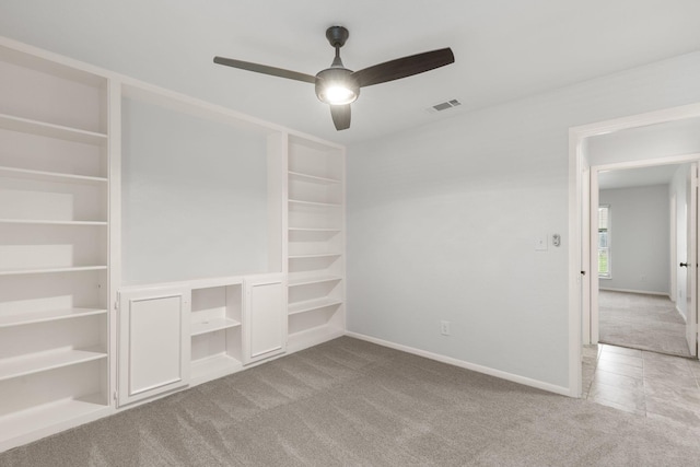 4814 Rhea Rd, Wichita Falls, TX 76308 - unfurnished bedroom with carpet, baseboards, and a ceiling fan
