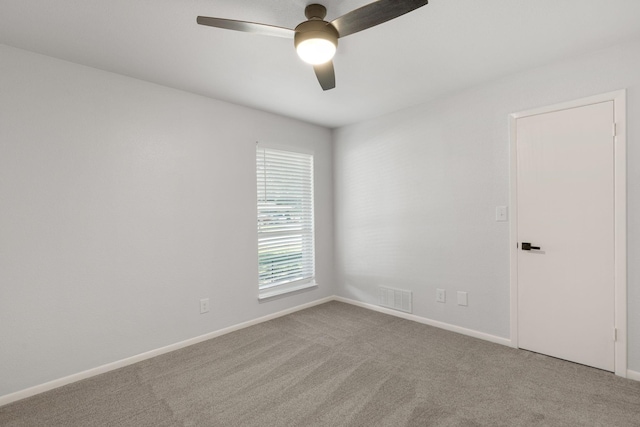 4814 Rhea Rd, Wichita Falls, TX 76308 - empty room with a ceiling fan, carpet flooring, and baseboards