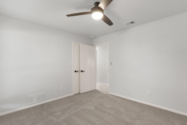 4814 Rhea Rd, Wichita Falls, TX 76308 - spare room featuring a ceiling fan, carpet, and baseboards