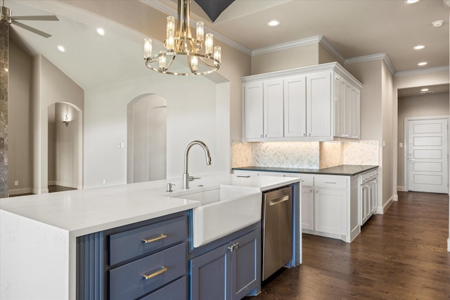 1209 Catalina Bay Blvd, Granbury, TX 76048 - kitchen featuring arched walkways, white cabinetry, a sink, tasteful backsplash, and dark wood-type flooring