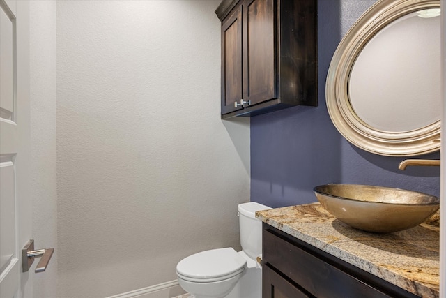 1209 Catalina Bay Blvd, Granbury, TX 76048 - half bathroom featuring vanity and toilet