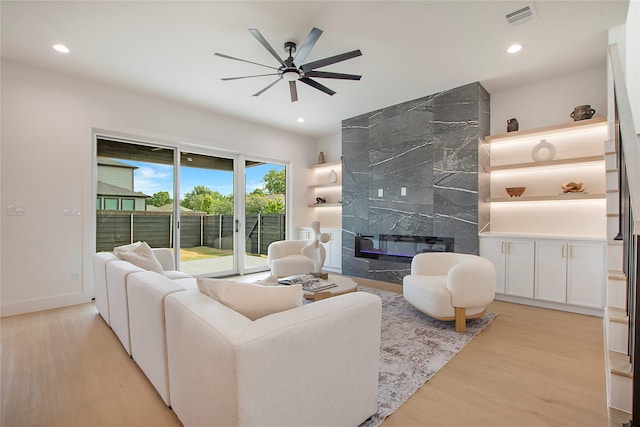 1903 Mcbroom St, Dallas, TX 75212 - living area with a ceiling fan, light wood-style flooring, recessed lighting, baseboards, and a fireplace