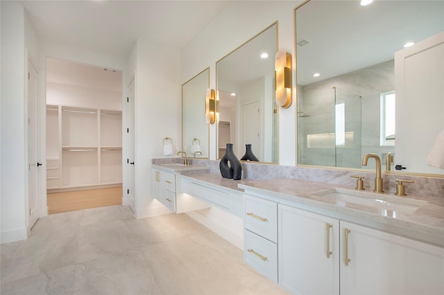 1903 Mcbroom St, Dallas, TX 75212 - full bath featuring double vanity, a walk in closet, a shower stall, and recessed lighting
