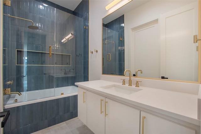 1903 Mcbroom St, Dallas, TX 75212 - full bathroom featuring tiled shower / bath combo, vanity, and tile patterned floors