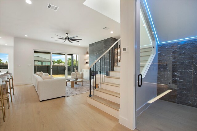1903 Mcbroom St, Dallas, TX 75212 - living room with wood finished floors, stairs, recessed lighting, a ceiling fan, and baseboards