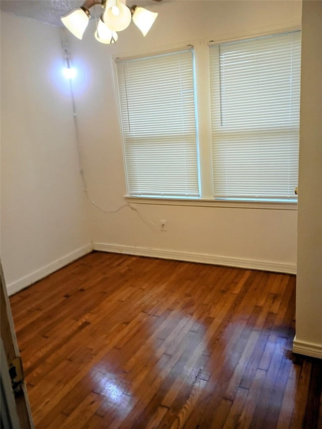 4330 Wabash Ave, Fort Worth, TX 76133 - spare room featuring hardwood / wood-style floors and baseboards
